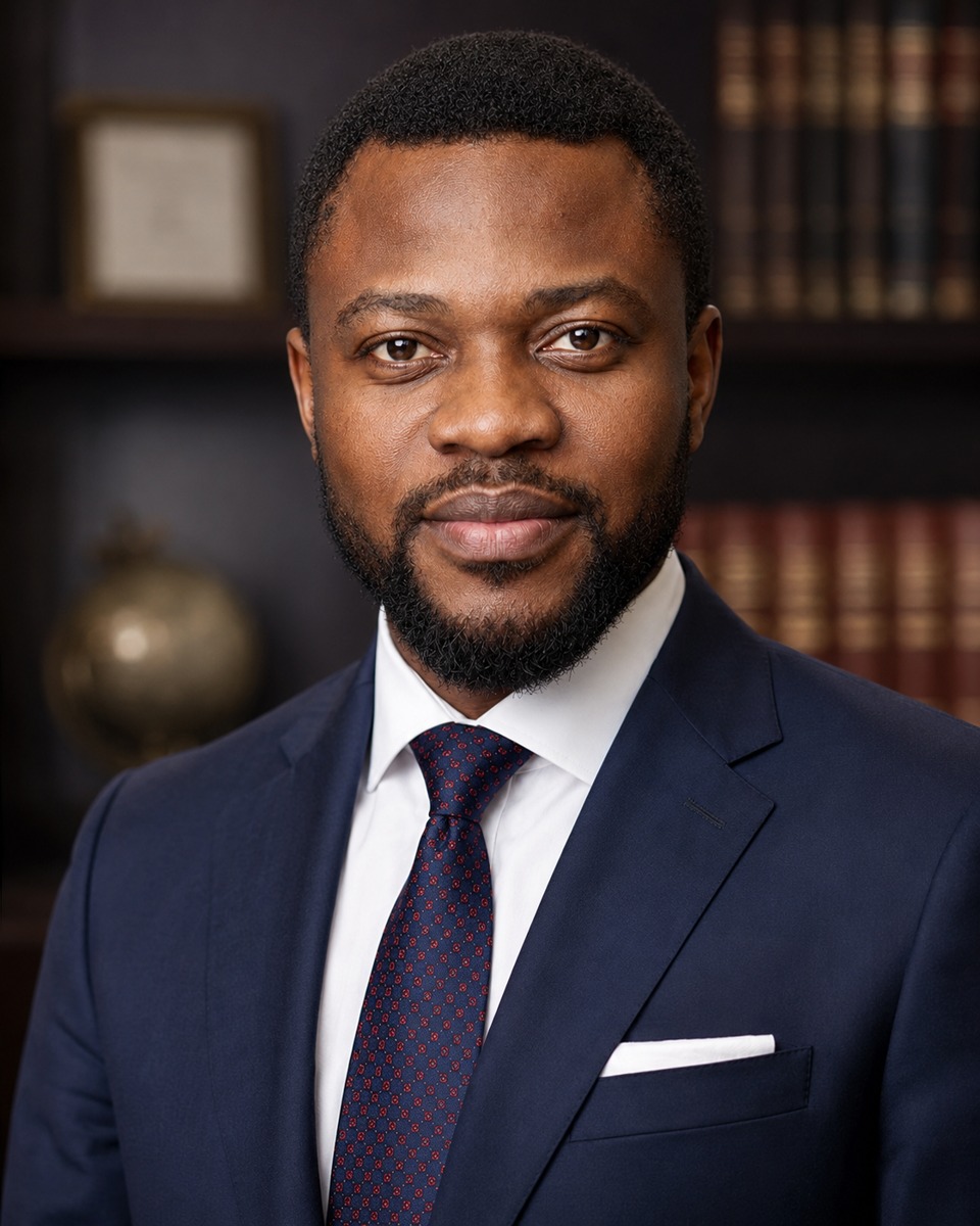 Professional portrait of John Ayeni